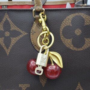 Authentic Louis Vuitton Lock & Key with Unbranded Apple Charm, Keychain